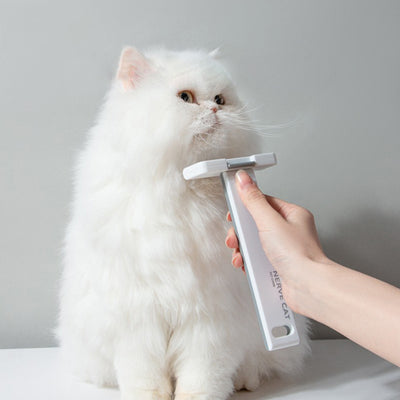 Floating FurMaster Grooming Tool for Cats